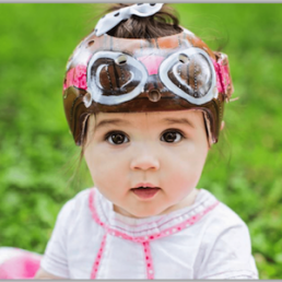 Baby with aviator medical helmet